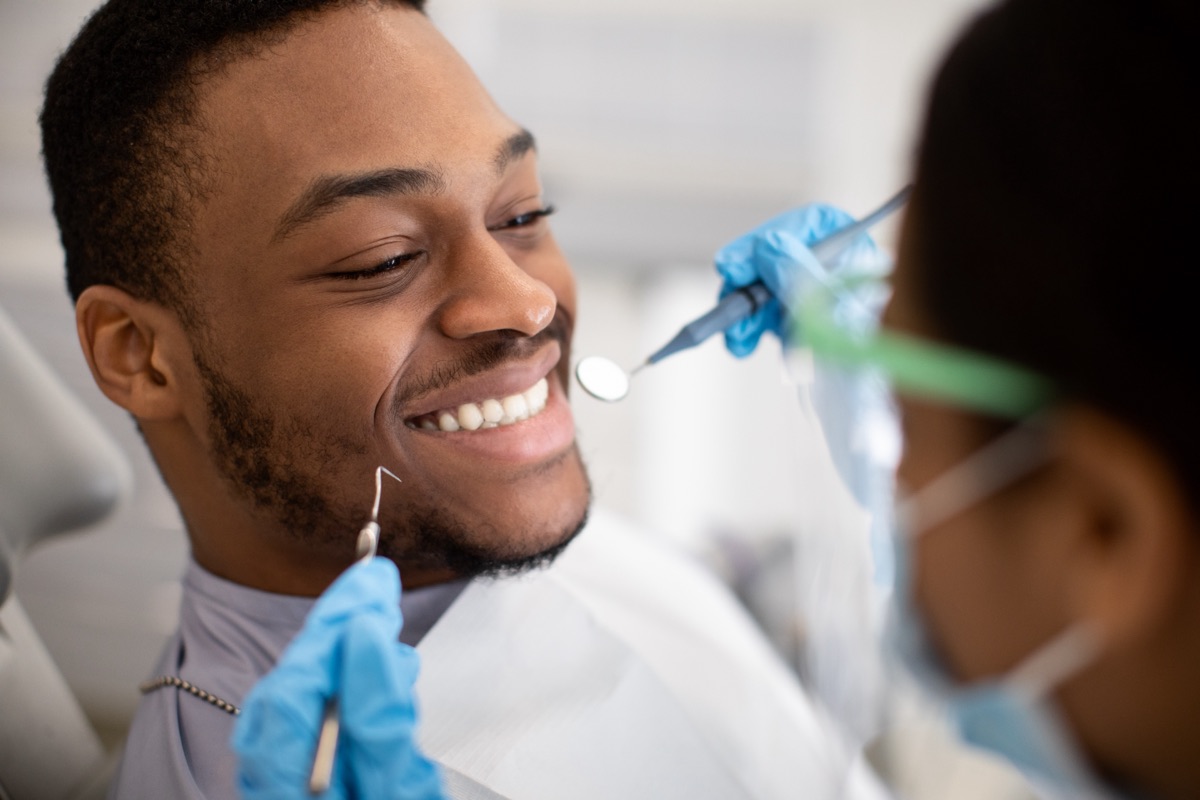 A smiling patient having a dental check-up